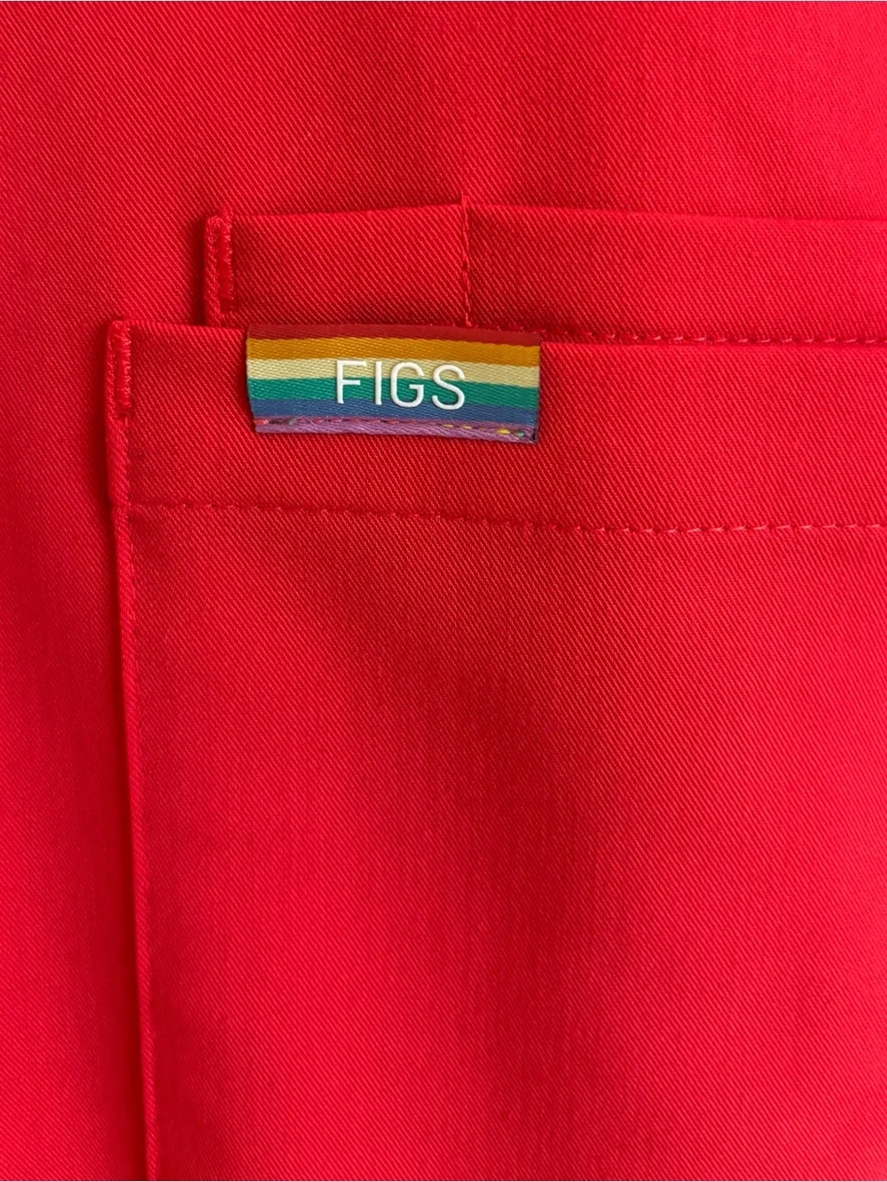 Figs men’s scrub set, medium. Dark coral/red with pride drawstring and tags.